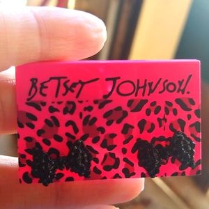 Black bow Betsey Johnson earrings.